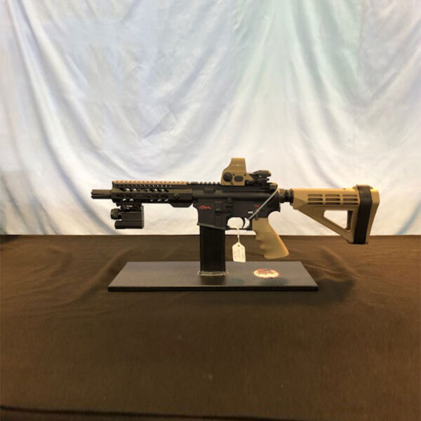 A gun that is on top of a table.